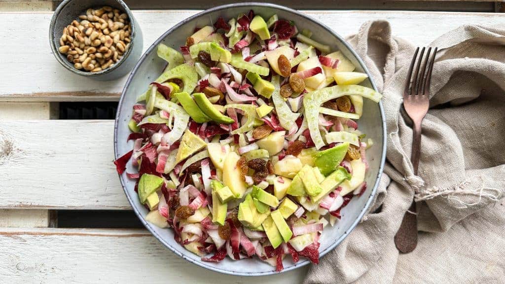 Fennel and chicory salad with raisins and apple